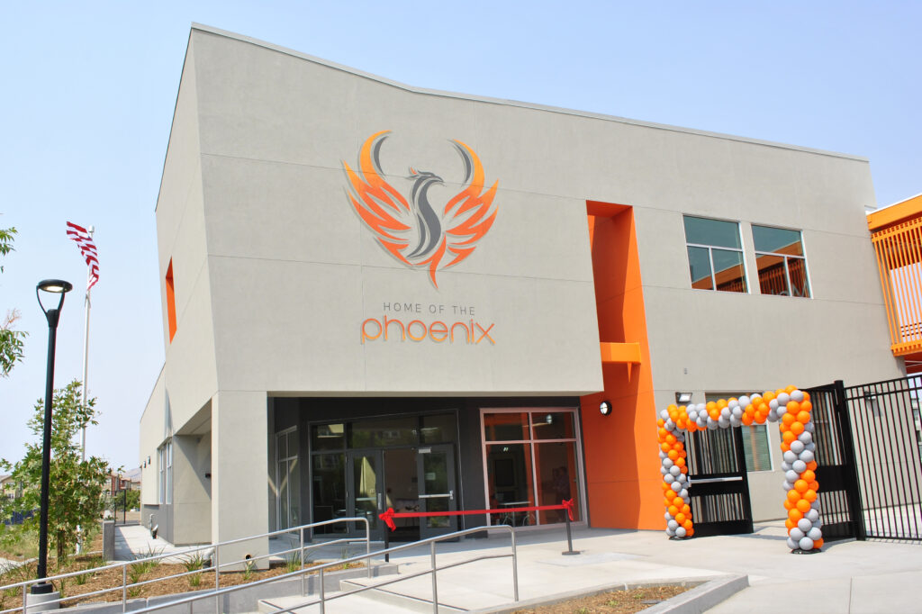 Phoenix logo on the exterior of the Mabel Mattos Elementary School building, showcasing the modern design and architecture.