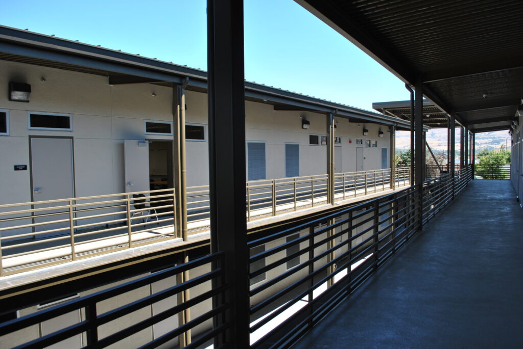 Second-floor hallway view of the modular building at WC Overfelt Adult Education Center, featuring durable and efficient construction.