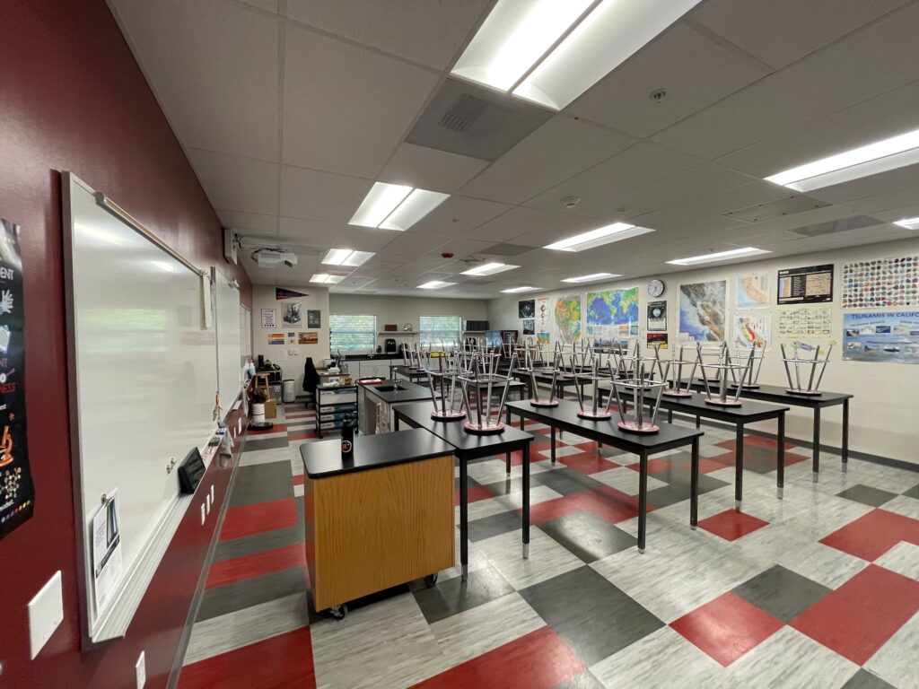 Interior of the new science classroom at Buckingham Collegiate Charter Academy with lab tables and whiteboards.